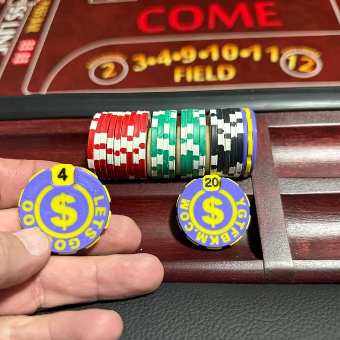 Purple roll counter held next to a chip rail